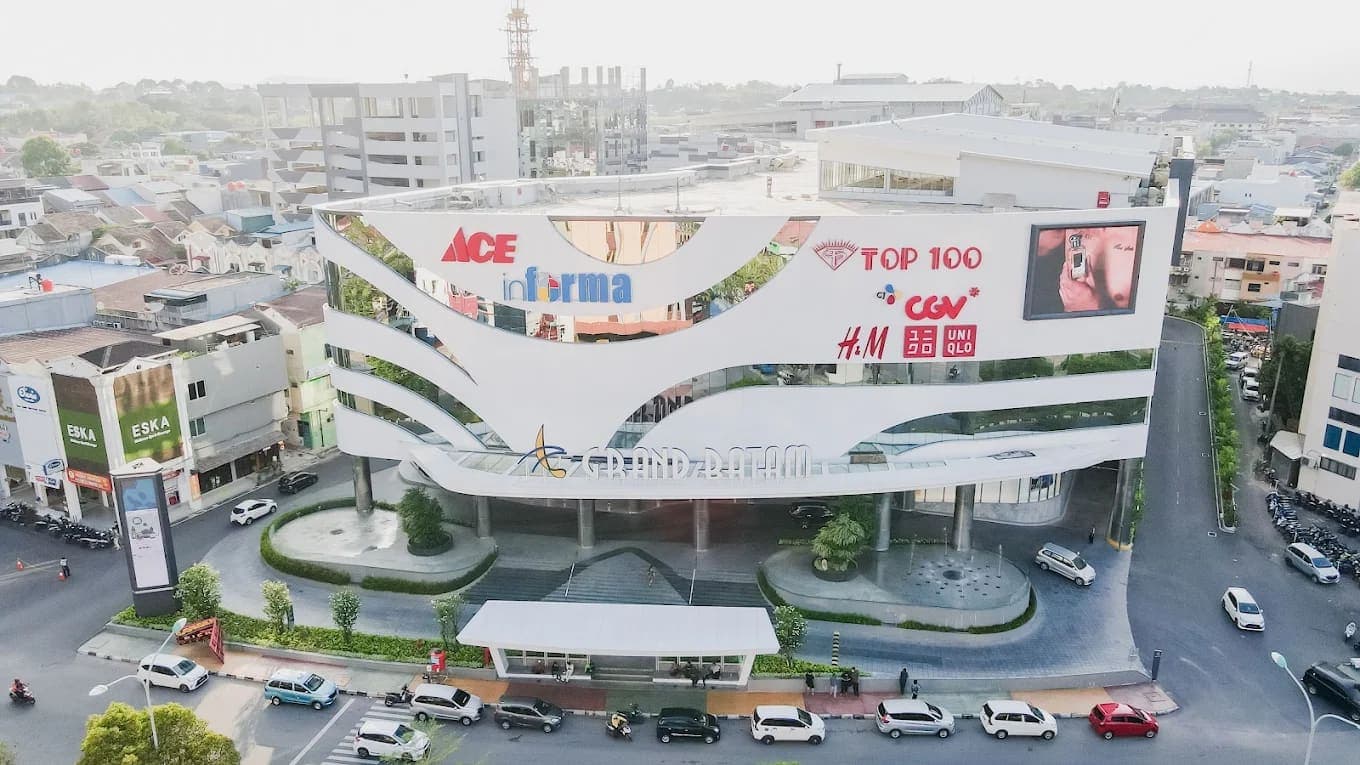 The Grand Batam Mall frontage from above, with cars on the road outside